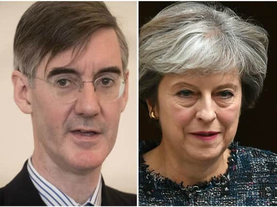 Conservative backbencher Jacob Rees-Mogg and prime minister Theresa May