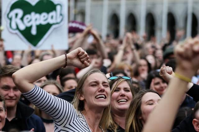 People celebrate at Dublin Castle as the official results of the referendum on the 8th Amendment of the Irish Constitution are announced in favour of the yes vote. Picture date: Saturday May 26, 2018. See PA story IRISH Abortion. Photo credit should read: Brian Lawless/PA Wire