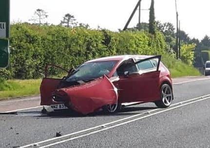 Car badly damaged on the Armagh Road Portadown this morning