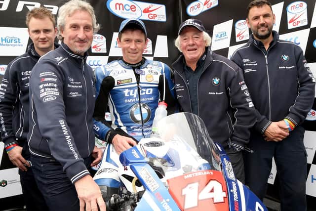 Manx rider Dan Kneen with the Tyco BMW team at the Ulster Grand Prix last August.