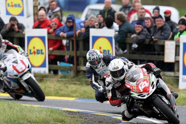 Dan Kneen leads the Superstock race at the Ulster Grand Prix in 2014 on the Burrows Engineering Suzuki.