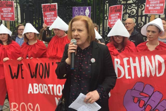 Ruth Coppinger TD addresses the crowds outside Belfast's Crown and High Courts where counter-demonstrations were held by both sides of the Northen Irish abortion argument. Northern Ireland is the only part of the UK where the procedure is not lega