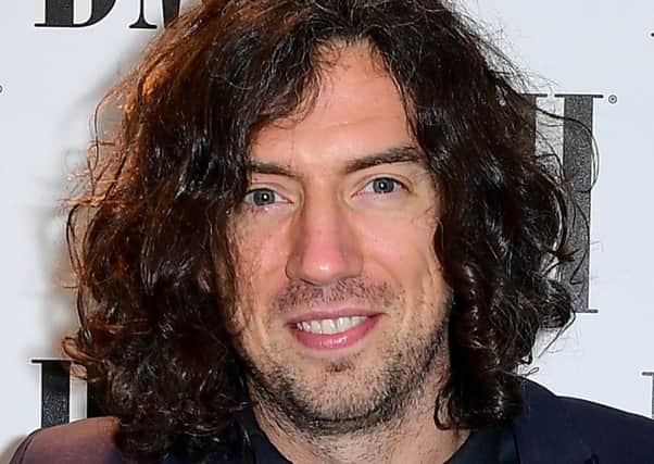 Gary Lightbody has apologised to fans after the band Snow Patrol were delayed on a flight from Manchester on their way to an appearance in Belfast.