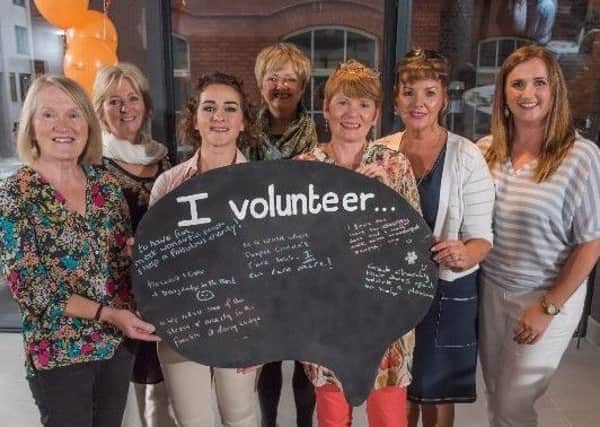 A group of Cancer Fund for Children volunteers who help support families while they are staying at the charitys Daisy Lodge short break centre