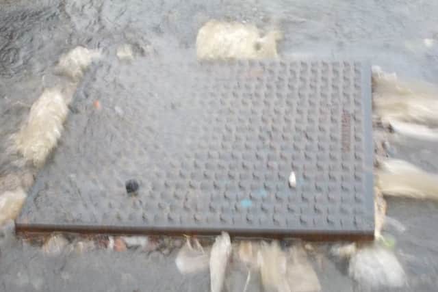 The overflowing manhole cover