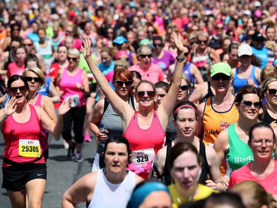 Participants make their way down Fitzwilliam Place at the start of the race as tens of thousands of women take to the streets of Dublin to take part in the 10 kilometre VHI Women's Mini Marathon.