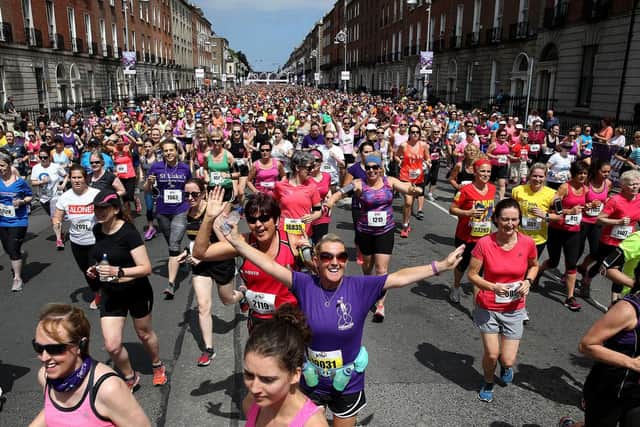 Participants make their way down Fitzwilliam Place at the start of the race as tens of thousands of women take to the streets of Dublin to take part in the 10 kilometre VHI Women's Mini Marathon