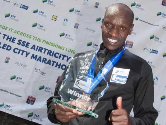 2018 Walled City Marathon winner and new course record holder, Dan Tanui of Project Africa pictured with his trophy.