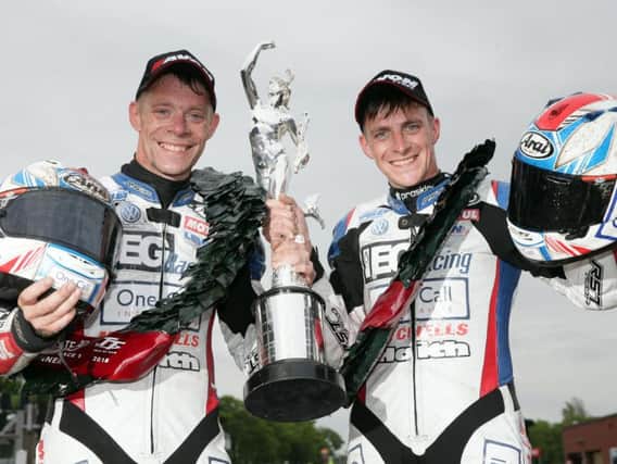 Ben and Tom Birchall dominated the opening Sidecar TT race on Saturday.