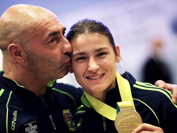 File photo dated 25/11/14 of boxing coach Pete Taylor with his daughter, Olympic gold medallist Katie Taylor.