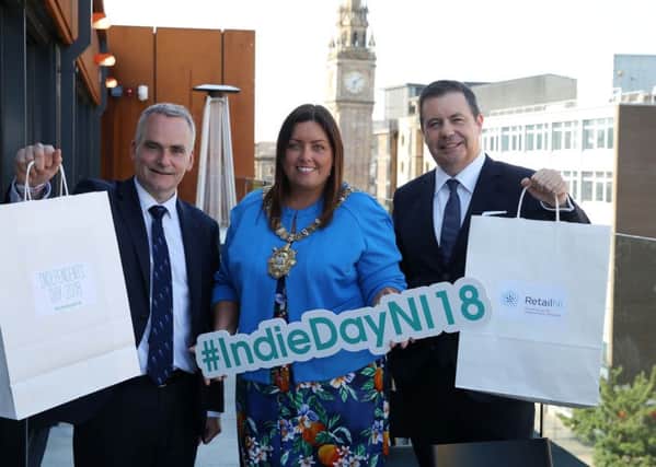 Belfast Lord Mayor Deirdre Hargey helps launch Independents Day with Translink CEO Chris Conway, left, and Retail NI chief Glyn Roberts