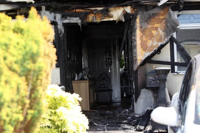 Detectives are appealing for information following an arson 
attack on a property in Larne.  Pictures by Freddie Parkinson/Press Eye