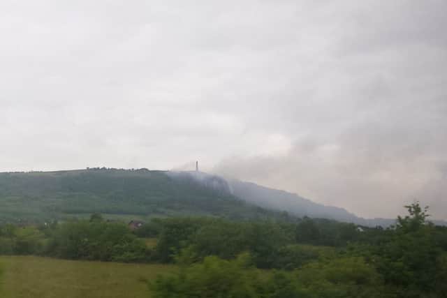 The fire at around 8.50am, pictured from the railway line between Jordanstown and Greenisland