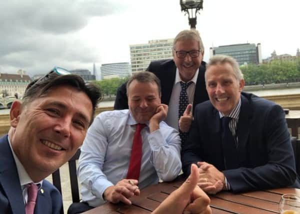 Andy Wigmore, Arron Banks, Sammy Wilson MP and Ian Paisley Junior MP on the House of Commons terrace after lunch, which took place after Banks and Wigmore walked out of a Commons committee hearing. Image taken from Paisley's twitter feed