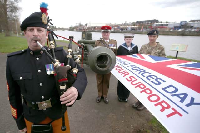 Pipe Major Wallace 152 (North Irish) Regiment The Royal Logistic Corps along with Major JD Taylor and cadets Athena Dunlop and Laura Pipinska helping promote Armed Forces Day in Coleraine on June 23.