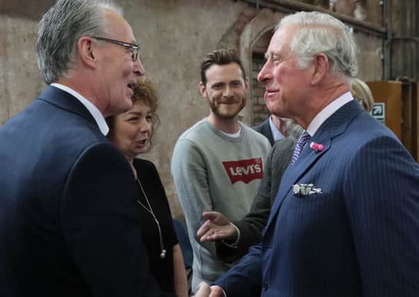 The Prince of Wales shakes hands with Sinn Fein MLA Gerry Kelly at Carlisle Memorial Church in Belfast where he is meeting the organisations involved in the regeneration of the building as a permanent home for the Ulster Orchestra. PRESS ASSOCIATION Photo. Picture date: Tuesday June 12, 2018. See PA story ROYAL Charles. Photo credit should read: Brian Lawless/PA Wire