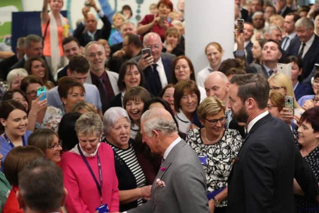 Large crowds greet the Prince of Wales as he visits Omagh Hospital as part of his tour of Northern Ireland