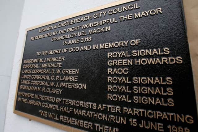 The plaque erected in Market Place, Lisburn in memory of the six murdered soldiers.