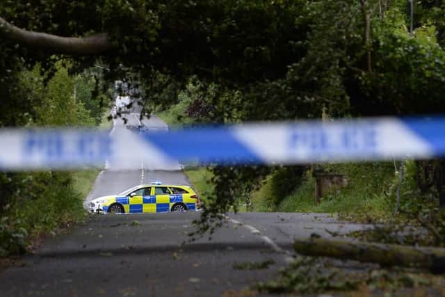 A fallen tree on the Glenavy Road near Lisburn blocks the road causing diversions for drivers as  Storm Hector batters Northern Ireland. Pic Colm Lenaghan/Pacemaker