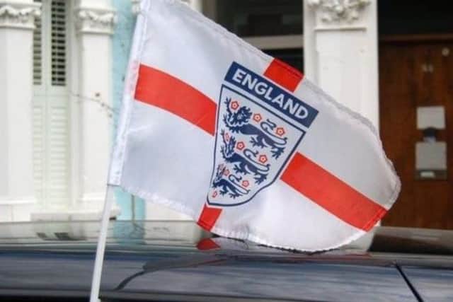The Royal Mail has banned any display of England flag on company vehicles