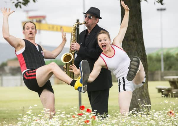 Getting ready for the EastSide Arts Festival were, from left, Eastside Arts Festival performers, Clarke Wilson from Celtic Soul, Henrik Gard and Ali Stranger from Tumble Circus.
  Picture by Brian Morrison