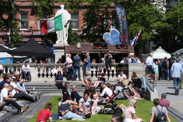 Another of the hot days: Friday May 25 at Belfast City Hall. 
Photograph by Declan Roughan