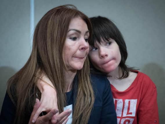 Billy Caldwell with his mother Charlotte. The severely epileptic child who had his cannabis medicine confiscated by the Home Office will remain in hospital after a string of life-threatening seizures.