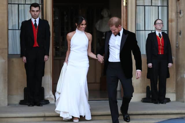 Meghan Markle and Prince Harry leaving their reception
