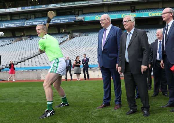 (left to right) ex Kilkenny hurler Henry Shefflin, European Commissioner Phil Hogan, President of the European Commission Jean-Claude Juncker and Ireland's minister for foreign affairs Simon Coveney  at Croke Park. So far the EU has stood by Ireland in its tough stance on Brexit. Photo: Brian Lawless/PA Wire