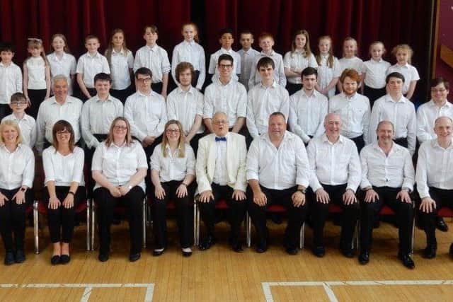 Third Carrickfergus Youth Band and tutors with Des Graham, who conducted the weekend of music.