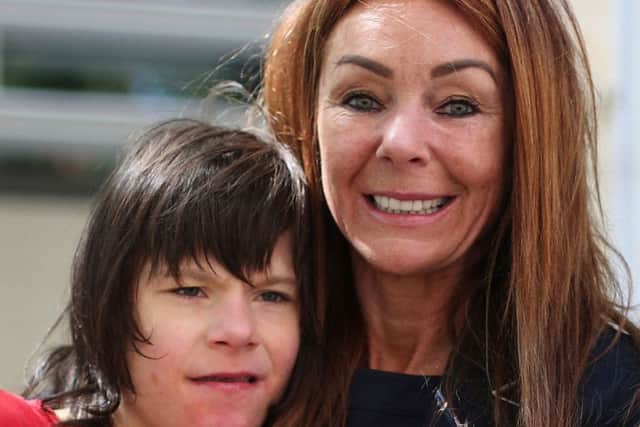 Charlotte Caldwell, with her son Billy, 12, who requires medical cannabis to treat severe epileptic seizures. Photo: Yui Mok/PA Wire