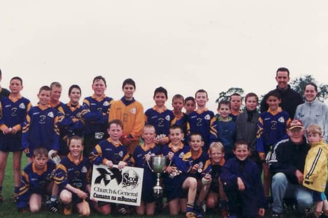 When St Peter's won the Ulster Schools title back in 1998 with Joe Fitzsimmons St Paul's GFC & Valerie Loughran, coach and Paul O'Hara, Clan na Gael