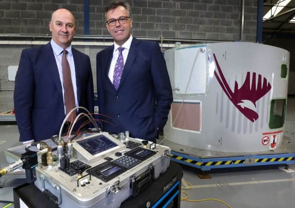 Pictured at its new premises at Queens Road, Belfast, are Eirtech Aviation Composites CEO David Kerr, left,  and Invest Northern Ireland chief executive Alastair Hamilton