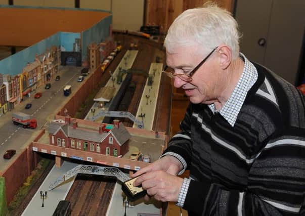 Railway enthusiast the late David Thompson pictured trying out his new Murphy Models 201 Enterprise locomotive at Cooke Model Railway Club in Cooke Centenary Presbyterian Church Hall, Belfast in January 2012.