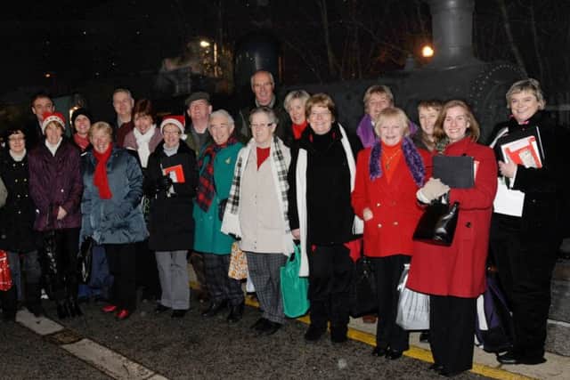 A flurry of snow created the idyllic atmosphere in December 2010 for Steam and Carols as choirmaster John Dallas and Cregagh Presbyterian Church Choir boarded a steam train to Newry that the late David Thompson hired for the choirss innovative fundraising event which was affectionately re-named - Sing-a-long-a-David.