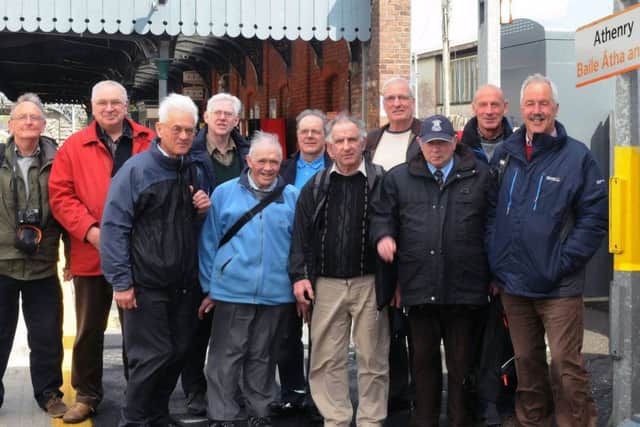 Trip organisers Ken Harte (third from left) and the late David Thompson (fourth from left) pictured in March 2015 with railway enthusiasts who stopped for a break at Athenry Train Station before travelling down the Western Corridor to Limerick.  On the return journey some added an extra two hours to the journey as they took the branch line from Limerick to Ballybrophy where they boarded the Cork to Dublin train making a round trip of about 500 miles in 15 hours through 15 counties in Ireland.
