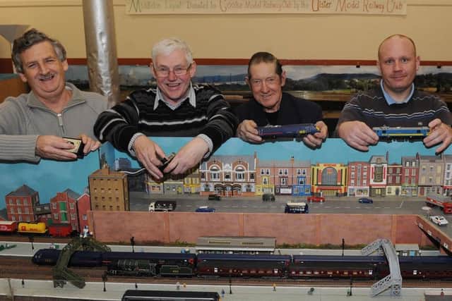 Enjoying an evening at the newly formed Cooke Model Railway Club are organisers Harvey Glenn (left) and club members David Thompson, John Boyd.