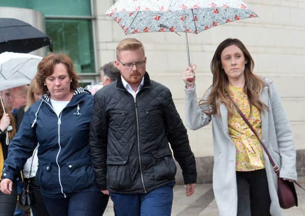 Family of murdered prison officer leaving Laganside Court on Tuesday.  Pic: Colm Lenaghan/Pacemaker