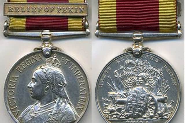 Front and back of Hugh McNeill's China War Medal