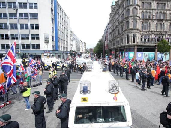 Police lines separated the demonstrations at Belfast City Hall