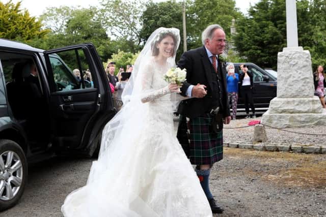 Rose Leslie arrives at the church ahead of her marriage to Kit Harrington in Aberdeenshire