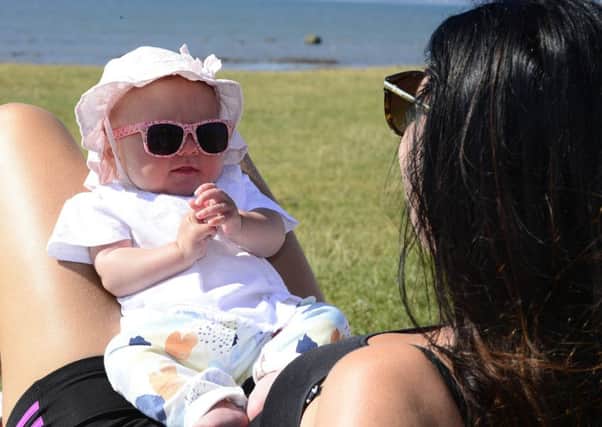 Little Rita Sullivan from Belfast enjoying the sunny weather at Seapark beach, near Holywood, on Sunday