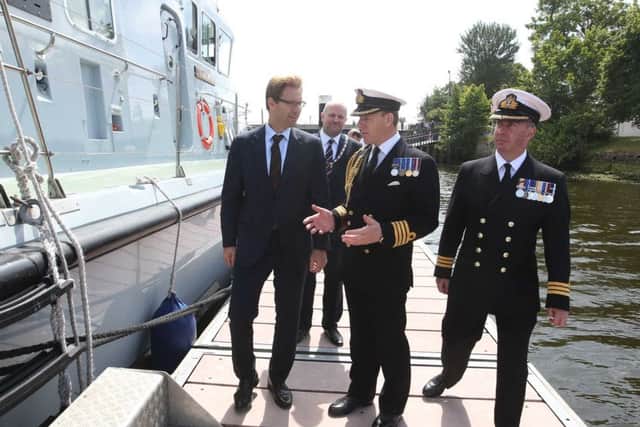 REPRO FREE.. Minister for Defence People and Veterans Tobias Ellwood MP in taken onboard HMS Tracker in Coleraine, County Londonderry for Northern Ireland Armed forces day, over 1200 Military and bands marched in the town. Pic Steven McAuley/McAuley Multimedia