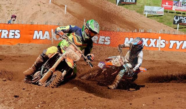 Local riders Jason Meara leads  Glenn McCormick battle for 11th in the MX2 race