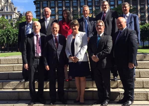 The 10 DUP MPs in London with their party leader Arlene Foster, shortly after their election in 2017