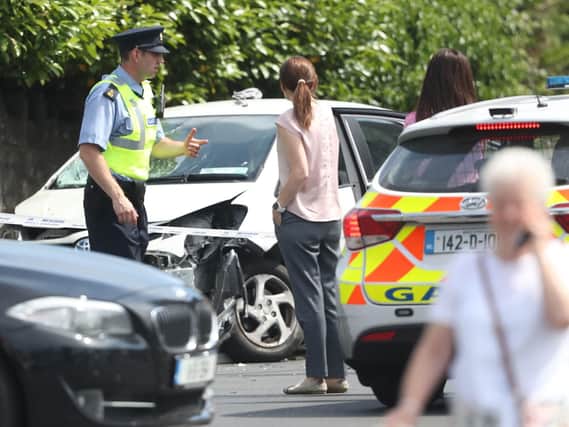 A damaged vehicle in the grounds of the Church of the Immaculate Conception in Clondalkin, south Dublin, two people were left critically ill in hospital after a car ploughed into a group of pedestrians at the church.