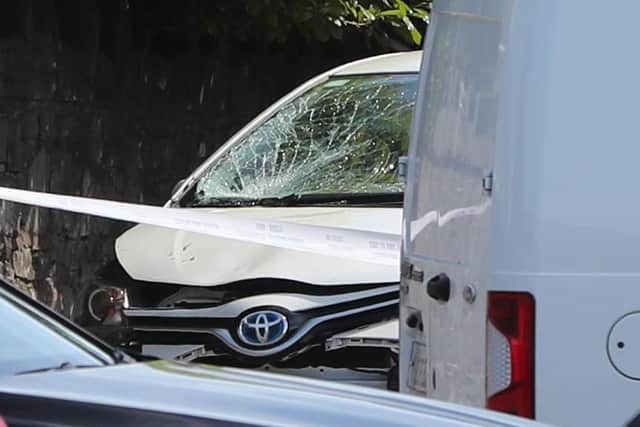 A damaged vehicle in the grounds of the Church of the Immaculate Conception in Clondalkin, south Dublin
