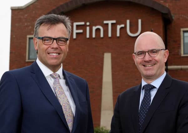 Invest NI CEO Alastair Hamilton pictured left with Fin Tru founding CEO Darragh McCarthy