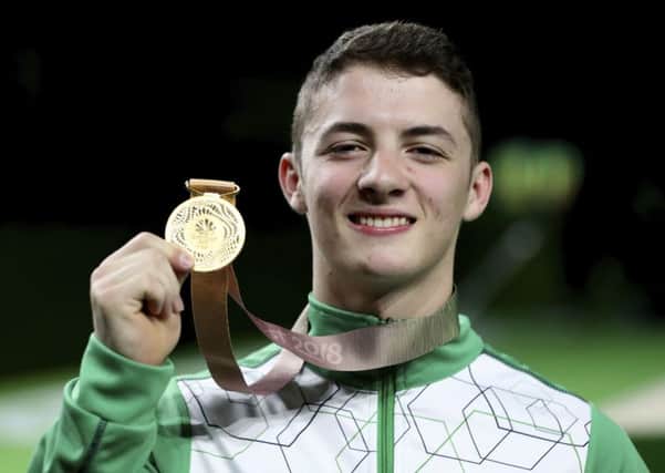 Gold medalist Rhys Mcclenaghan of Northern Ireland celebrates after winning men's pommel horse event during the artistic gymnastics men's apparatus final at Coomera Indoor Stadium during the Commonwealth Games on the Gold Coast