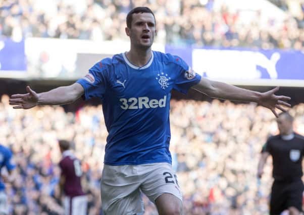 Rangers Jamie Murphy celebrates